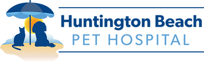 Logo for Huntington Beach Pet Hospital featuring a silhouette of a cat and dog sitting on sand under a blue beach umbrella with the sun in the background, next to the hospital’s name in bold text—perfect for your trusted local veterinarian.